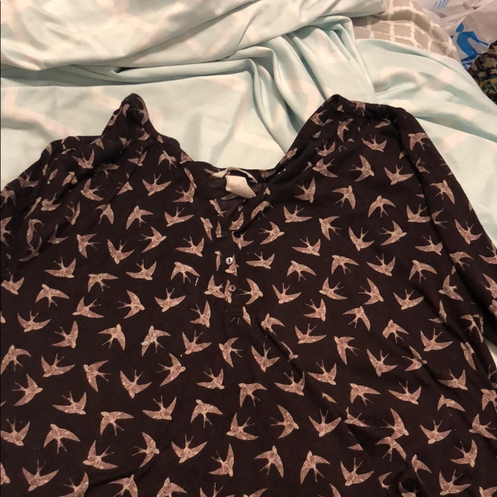 Maroon top with birds on it